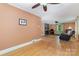 Open living room with hardwood floors, fireplace, and lots of natural light at 3332 Celanese Rd, Rock Hill, SC 29732