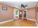 Living room with hardwood floors, natural light, and an adjoining kitchen at 3332 Celanese Rd, Rock Hill, SC 29732