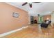 Open living room with hardwood floors, fireplace, and lots of natural light at 3332 Celanese Rd, Rock Hill, SC 29732