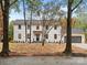 Charming two-story modern farmhouse with black trim and large front yard at 3417 Chilham Pl, Charlotte, NC 28226