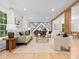 Inviting living room with modern furnishings, stylish decor, and an abundance of natural light at 3417 Chilham Pl, Charlotte, NC 28226