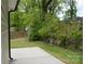 Spacious backyard featuring a concrete patio and lush greenery, perfect for outdoor entertaining and relaxation at 379 Maiden Sw Ln, Concord, NC 28025