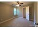 Bedroom featuring neutral walls, carpet flooring, and a door to an adjoining closet at 379 Maiden Sw Ln, Concord, NC 28025