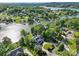 Stunning aerial view of a lakefront home with a pool, lush landscaping, and private dock at 4039 5Th Nw St, Hickory, NC 28601