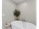 Modern bathroom featuring a freestanding tub and contemporary fixtures at 4039 5Th Nw St, Hickory, NC 28601