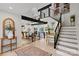 Elegant foyer with a modern staircase, open floor plan, and abundant natural light at 4039 5Th Nw St, Hickory, NC 28601