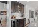 Contemporary kitchen featuring custom cabinetry, wine fridge, stainless steel appliances, and stylish countertops at 4039 5Th Nw St, Hickory, NC 28601