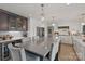 Modern kitchen with a large island, stainless steel appliances, and a combination of white and dark cabinetry at 4039 5Th Nw St, Hickory, NC 28601