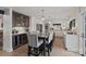 Spacious kitchen with a large island, stainless steel appliances, and a combination of white and dark cabinets at 4039 5Th Nw St, Hickory, NC 28601