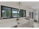 Bright kitchen featuring a farmhouse sink, subway tile backsplash, and a large window with scenic views at 4039 5Th Nw St, Hickory, NC 28601