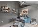 Stylish office with a unique desk, ample storage, and decor, lit by an eye-catching modern chandelier at 4039 5Th Nw St, Hickory, NC 28601