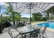 Enjoy this beautiful outdoor deck area with a pool and lake views at 4039 5Th Nw St, Hickory, NC 28601