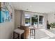 Poolside area featuring a bar area with stools and glass sliding doors that open to a pool at 4039 5Th Nw St, Hickory, NC 28601