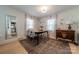 Dining room featuring an elegant table set, modern lighting, and tasteful decor throughout at 4544 Craig Ave, Charlotte, NC 28211