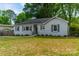 Classic single-story home with a well-maintained lawn and attractive exterior details at 4544 Craig Ave, Charlotte, NC 28211