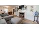 Living room featuring a fireplace with mantel decor, built-in shelving and a cozy sofa at 4544 Craig Ave, Charlotte, NC 28211