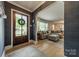 Welcoming foyer leading to a cozy living room, showcasing a comfortable and stylish interior at 4544 Craig Ave, Charlotte, NC 28211