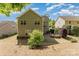 Home with a lovely backyard featuring a patio with a fire pit, grill, and outdoor seating, surrounded by lush greenery at 4861 Samuel Pinckney Dr, Belmont, NC 28012