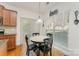 Cozy breakfast nook featuring a round table, bright window, and stylish decor at 4861 Samuel Pinckney Dr, Belmont, NC 28012