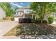 Charming two-story home with a well-manicured lawn, two-car garage, and inviting front porch at 4861 Samuel Pinckney Dr, Belmont, NC 28012