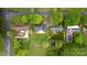 Aerial view shows the home is situated on a large lot with mature trees and a spacious backyard at 4935 Kennedy St, Hickory, NC 28602