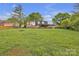 Expansive backyard featuring a large, grassy area, perfect for outdoor activities and entertaining guests at 4935 Kennedy St, Hickory, NC 28602