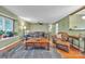 Inviting living room featuring hardwood floors, a cozy seating arrangement, and natural light from a window at 4935 Kennedy St, Hickory, NC 28602
