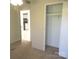 Comfortable bedroom includes neutral carpet, a ceiling fan, and closet space at 5180 Macedonia Church Rd, Vale, NC 28168