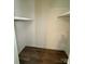 Walk-in closet featuring built in shelving at 629 Belmorrow Dr, Charlotte, NC 28214