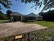Ranch home featuring a carport and screened porch at 629 Belmorrow Dr, Charlotte, NC 28214