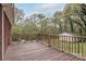 Spacious deck overlooking greenery, perfect for relaxation and outdoor enjoyment at 668 Riverside Dr, Lincolnton, NC 28092
