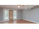 Inviting living area boasting hardwood floors and natural light with doors at 668 Riverside Dr, Lincolnton, NC 28092