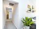 Hallway decorated with wall art and a plant at 7731 Ivy Hollow Dr, Charlotte, NC 28227