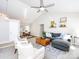 Spacious open-concept living and dining area with vaulted ceiling, neutral palette, and natural light at 7731 Ivy Hollow Dr, Charlotte, NC 28227