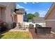Cozy backyard patio area with outdoor seating, grilling area, and stylish accents at 7850 Bud Henderson Rd, Huntersville, NC 28078