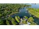 Aerial view highlighting property lines in lakeside community, showcasing prime real estate with waterfront access and privacy at 7851 Green Cove Ct, Denver, NC 28037