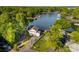 Stunning aerial view of a lakeside home with lush landscaping and access to the serene waters at 7851 Green Cove Ct, Denver, NC 28037