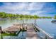 Picturesque view of the lake from the wooden dock, perfect for boating and waterside enjoyment at 7851 Green Cove Ct, Denver, NC 28037