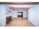Spacious living area with a cozy fireplace, hardwood floors, and an open floor plan at 7851 Green Cove Ct, Denver, NC 28037