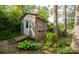 Exterior view of shed with weathered wooden exterior at 7851 Green Cove Ct, Denver, NC 28037