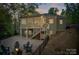 Home's backyard features a fire pit, patio, screened-in porch, and an outdoor grill at 8086 Summit Ridge Dr, Catawba, NC 28609