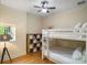 Bedroom features a bunkbed with built-in storage and hardwood flooring at 8086 Summit Ridge Dr, Catawba, NC 28609
