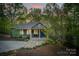 Charming craftsman home featuring a landscaped front yard with stone path and a welcoming front porch at 8086 Summit Ridge Dr, Catawba, NC 28609