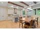 Bright eat-in kitchen features wood beams, stainless steel appliances, and light wood floors at 8086 Summit Ridge Dr, Catawba, NC 28609