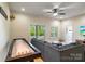 Recreation room featuring natural light, a shuffleboard table, and comfortable seating at 8086 Summit Ridge Dr, Catawba, NC 28609