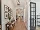 Bright foyer with hardwood floors, fresh paint, and access to living spaces at 8708 Soaring Eagle Ln, Waxhaw, NC 28173