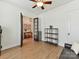 Home office space with hardwood floors, french doors, and ample storage space at 8708 Soaring Eagle Ln, Waxhaw, NC 28173
