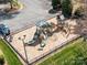 A wonderful playground surrounded by green grass and a parking lot for easy access at 8708 Soaring Eagle Ln, Waxhaw, NC 28173