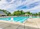 A gorgeous community pool featuring lap lines, a relaxing area, and plenty of space for people to enjoy at 8708 Soaring Eagle Ln, Waxhaw, NC 28173