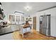 Well-designed kitchen with white cabinets, wood countertops, an island, and modern stainless steel appliances at 901 Central Dr, Kannapolis, NC 28083